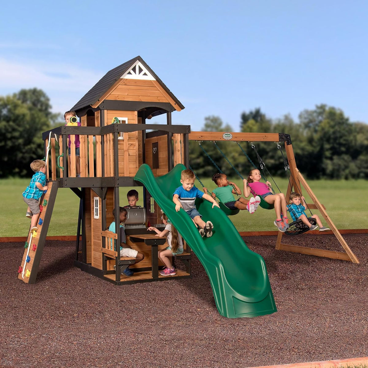 Backyard Discovery Canyon Creek Cedar Wood Swing Set with Wave Slide, Clubhouse, Play Kitchen, Picnic Area - Product image 1