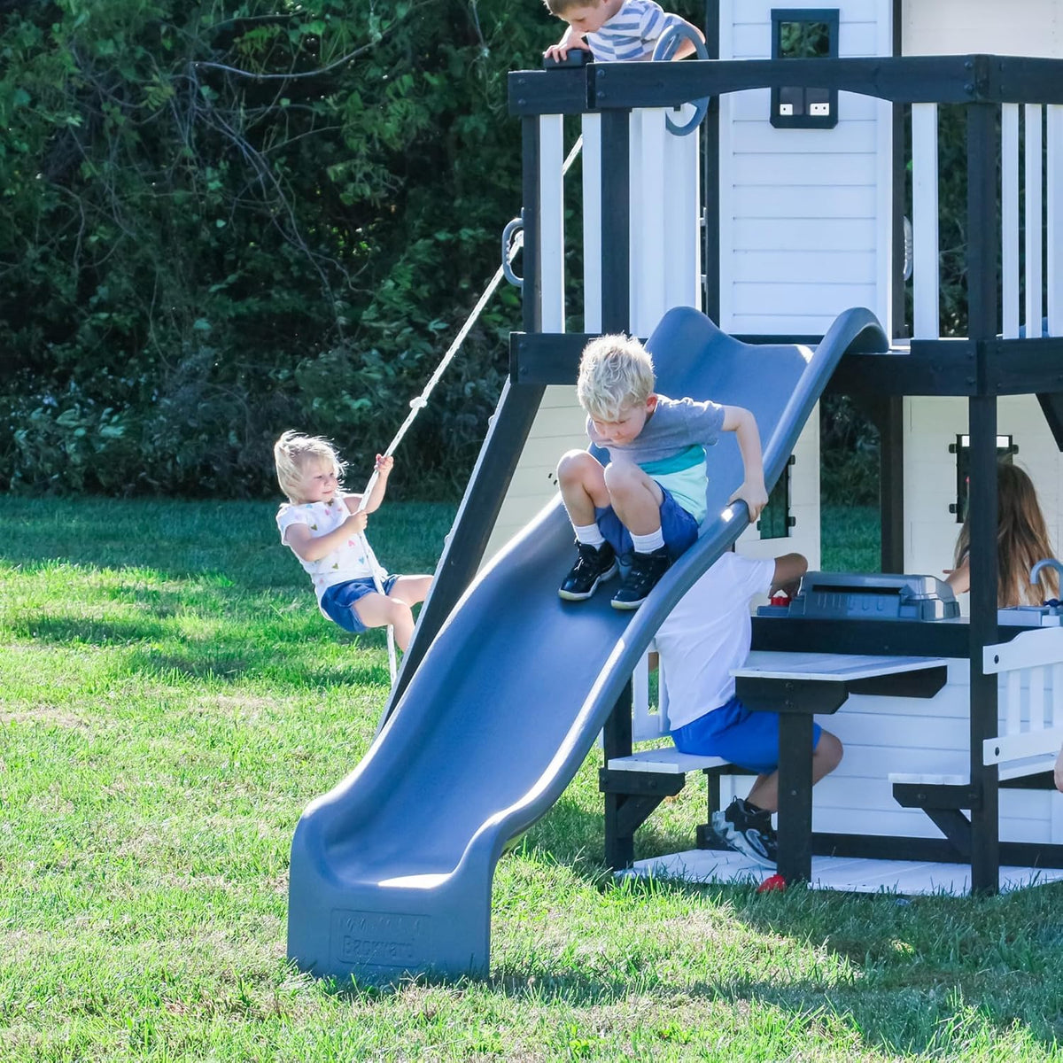 Backyard Discovery Canyon Creek Cedar Wood Swing Set with Wave Slide, Clubhouse, Play Kitchen - Product image 17